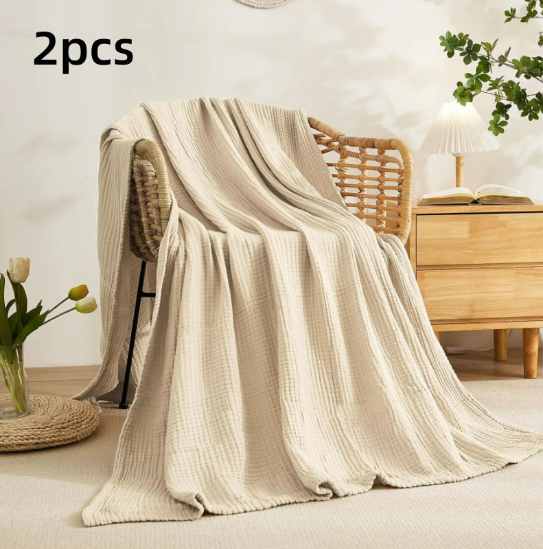 Couverture en mousseline au pied du lit, idée cadeau de Noël