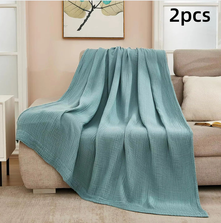 Couverture en mousseline de coton en beige, vert sauge et rose poudré